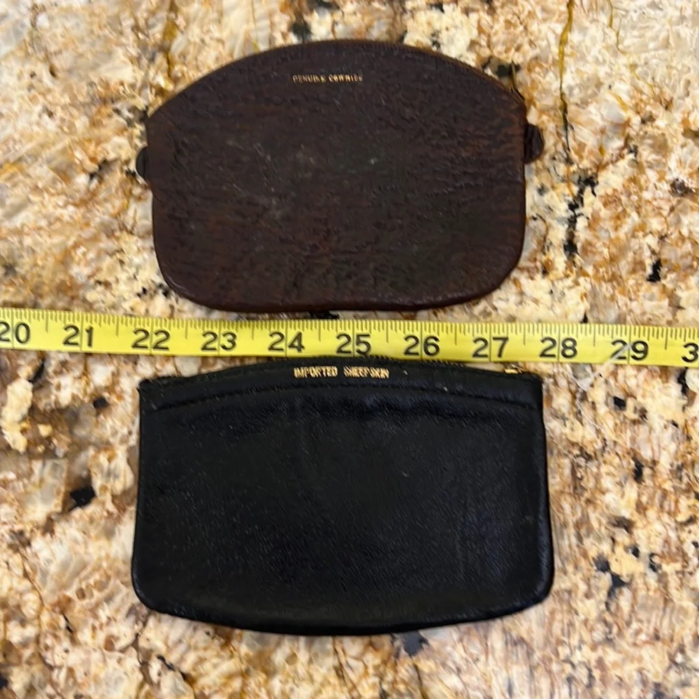 Vintage two leather wallets .